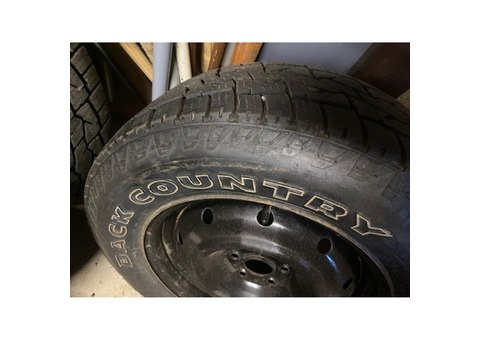 Four 3-Season Tires with Rims
